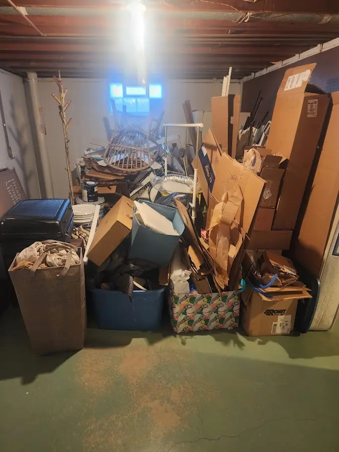 Roll-off dumpster container at job site for 2 Yard Dumpster Rental in Providence